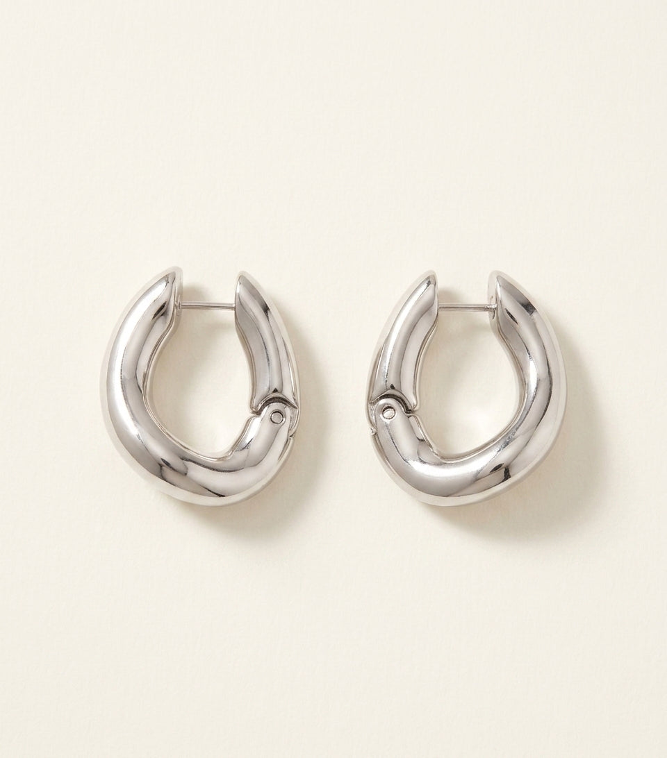 Balenciaga hoop earrings in polished copper, imported from the UK