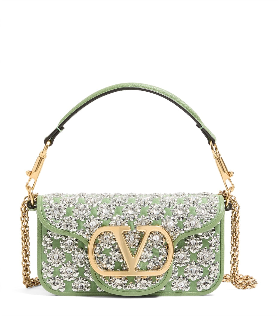 Valentino Garavani small Locò embellished shoulder bag, imported from the UK