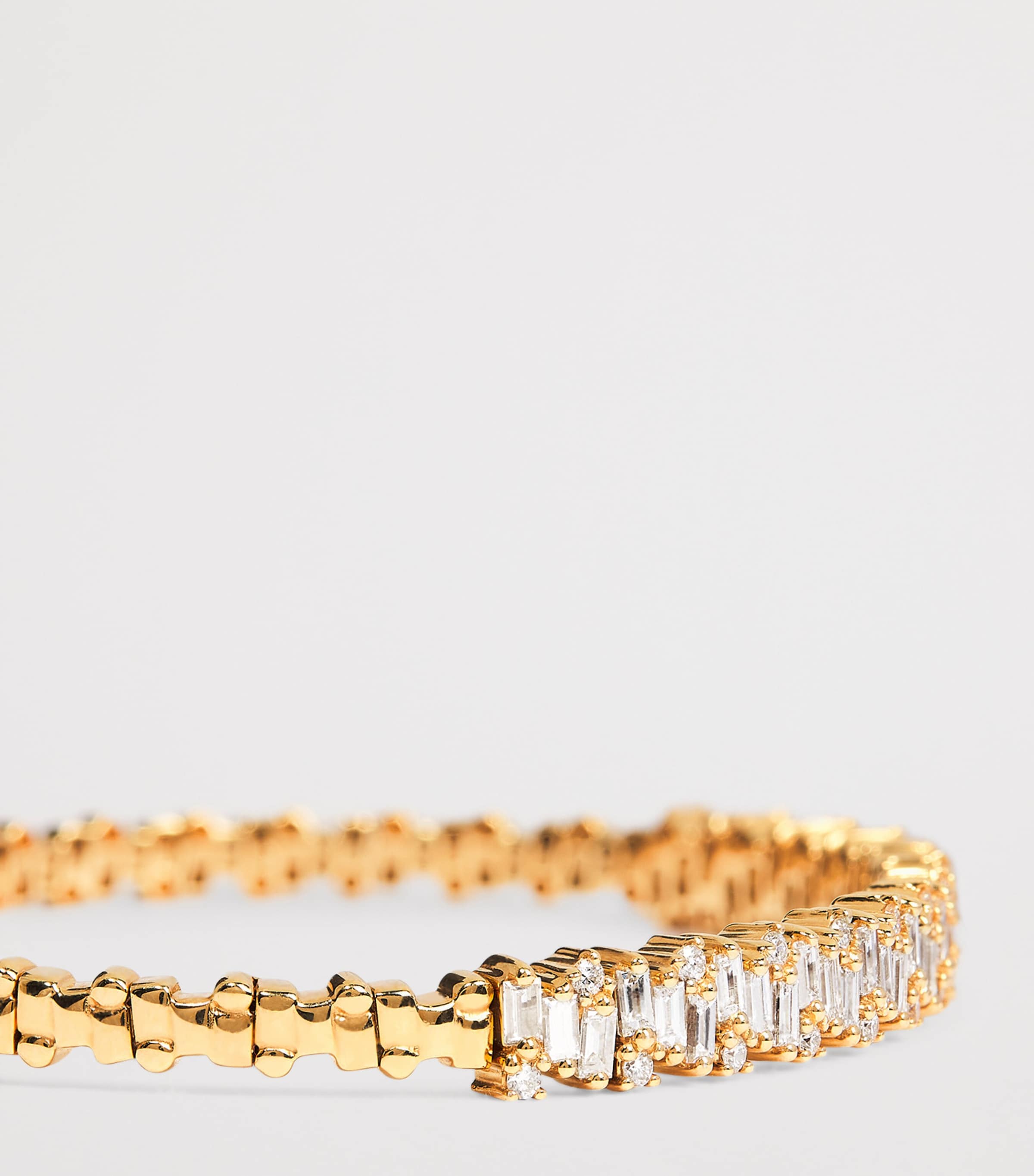 Suzanne Kalan yellow gold and diamond bangle (British brand)