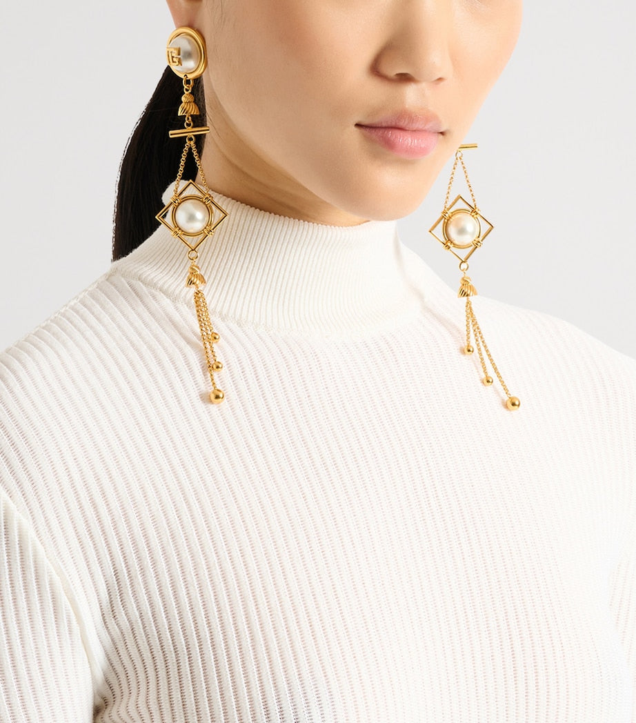 Balmain monogram pendant earrings brass, UK version