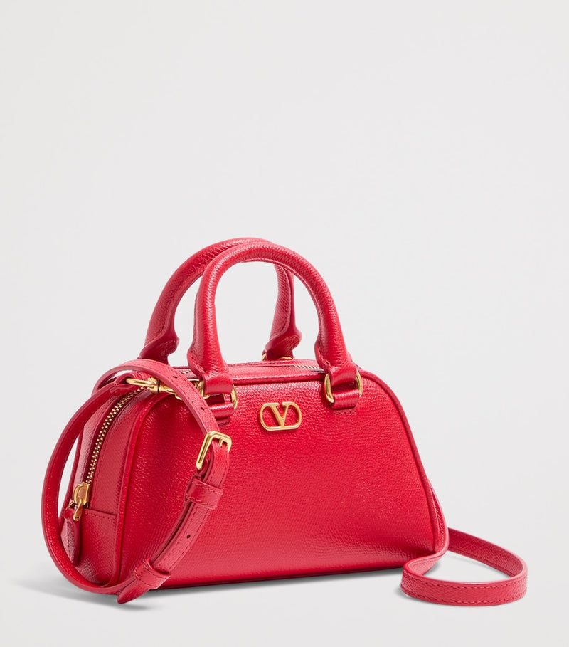 Valentino Garavani VLogo mini leather top-handle bag (British brand)