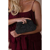 SVNX crystal pouch clutch bag in black, imported from the UK