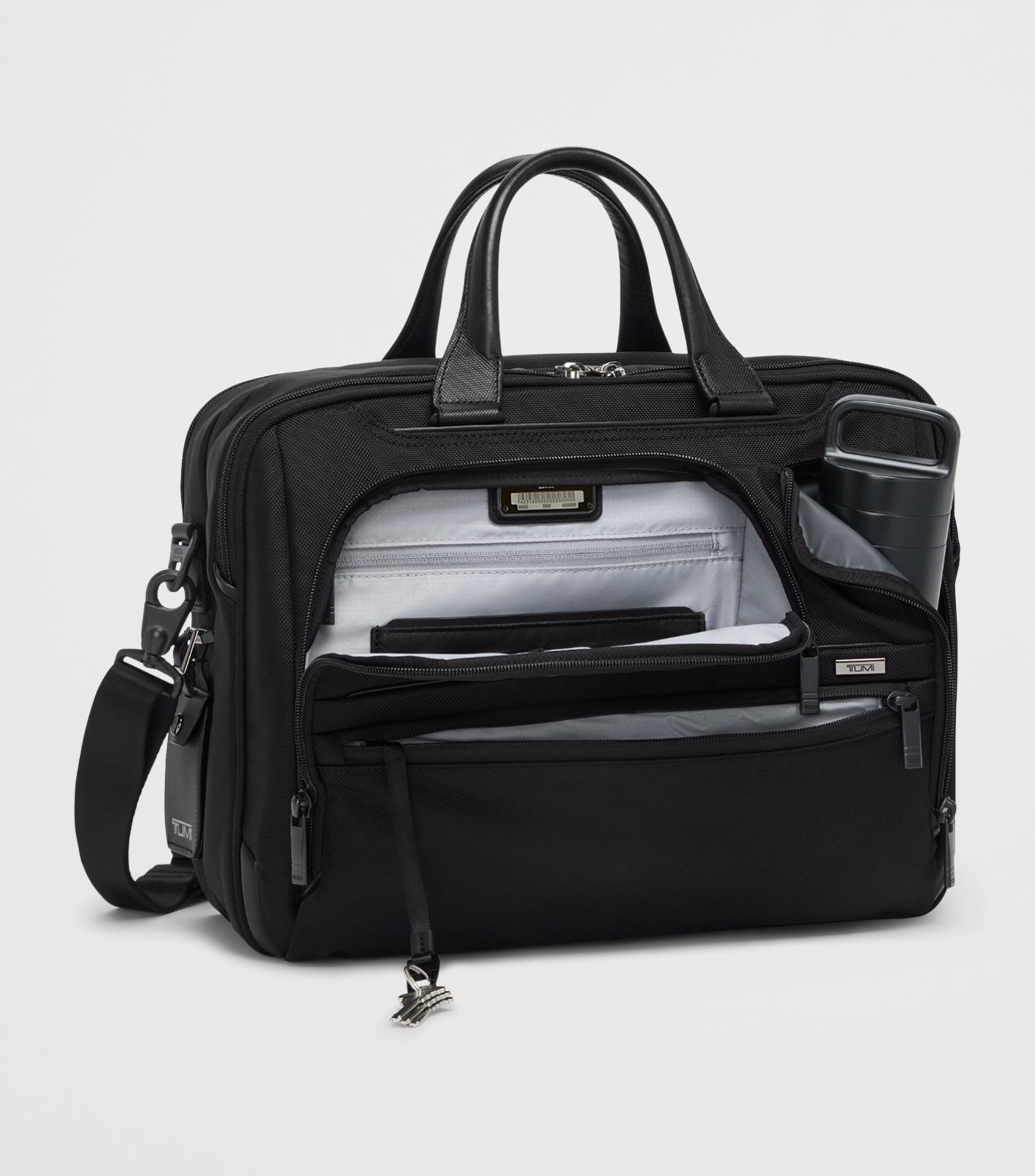 Tumi Alpha 4 expandable briefcase for 15-inch laptop, imported from the UK