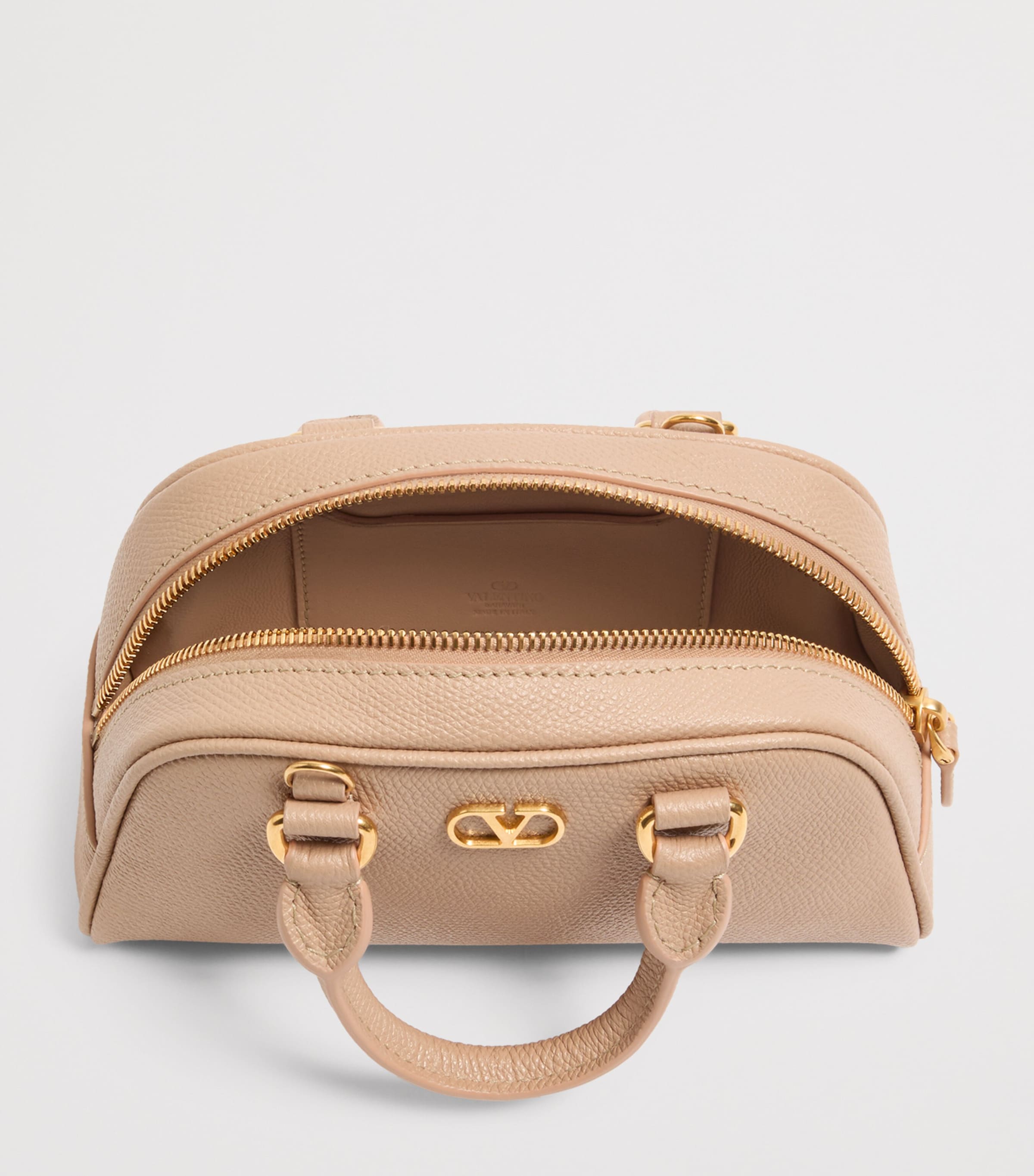 Valentino Garavani mini grained leather VLogo Signature bag, imported from the UK