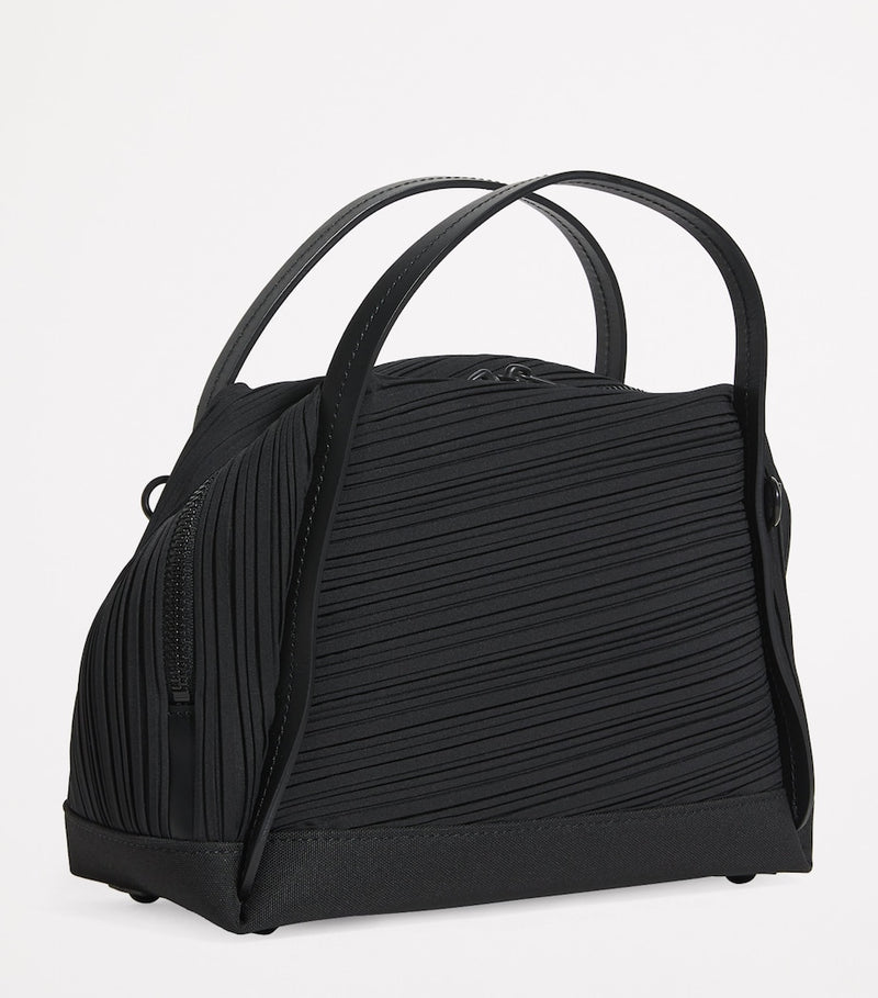 Pleats Please Issey Miyake mini bias pleats duffle bag, imported from the UK