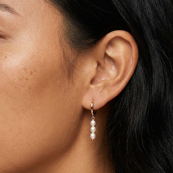 MUCHV gold small hoop earrings with natural baroque pearl charms (British brand)