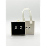 SVNX studded bow earrings with hanging pearl in gold, UK version