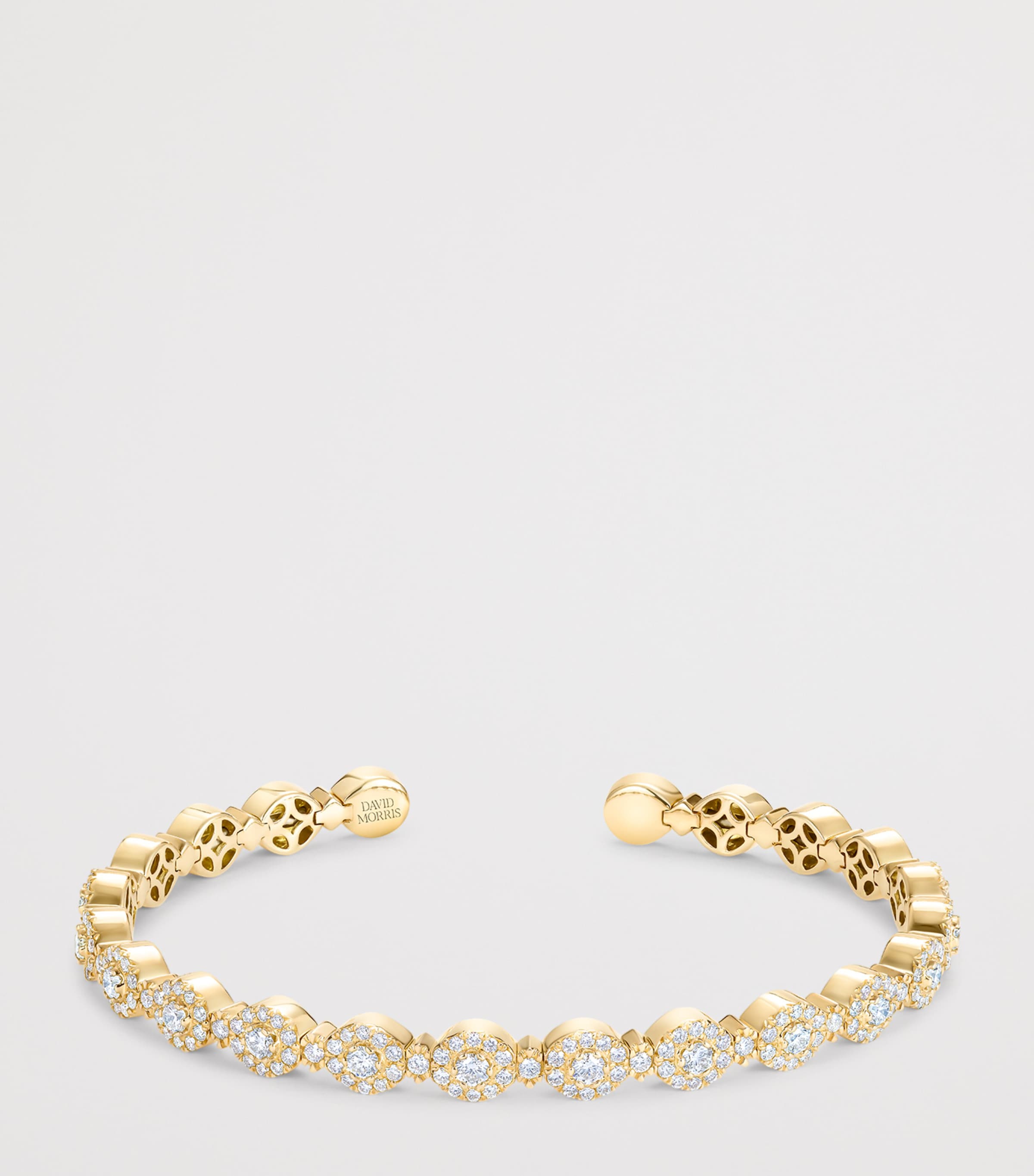 David Morris oval yellow gold diamond bangle (British brand)