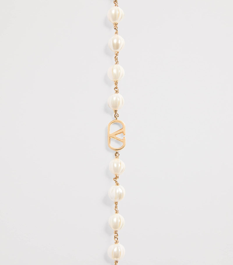 Valentino Garavani faux pearl VLogo bracelet - British product