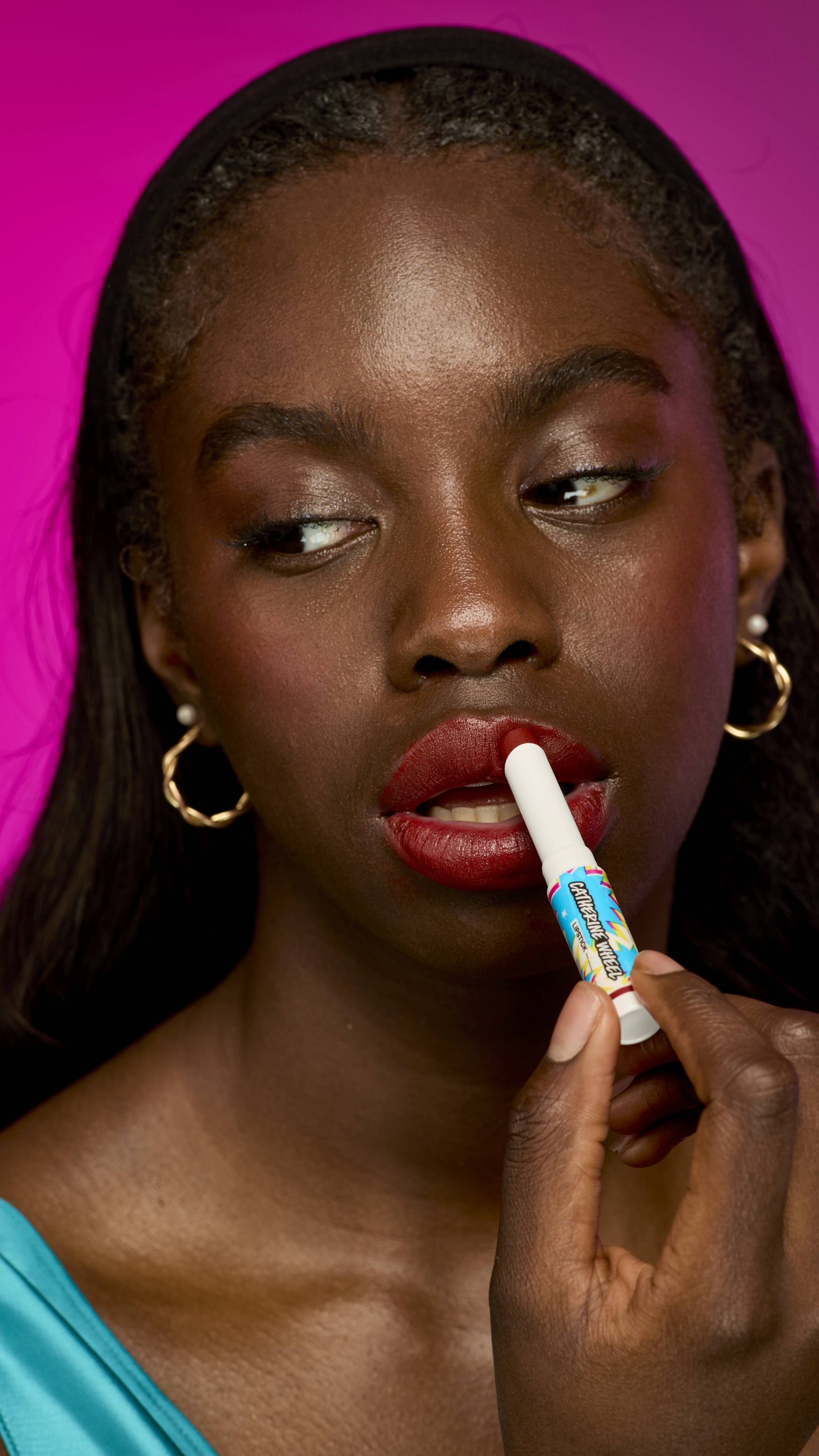 Lush Catherine Wheel lipstick in brick-red satin, imported from the UK
