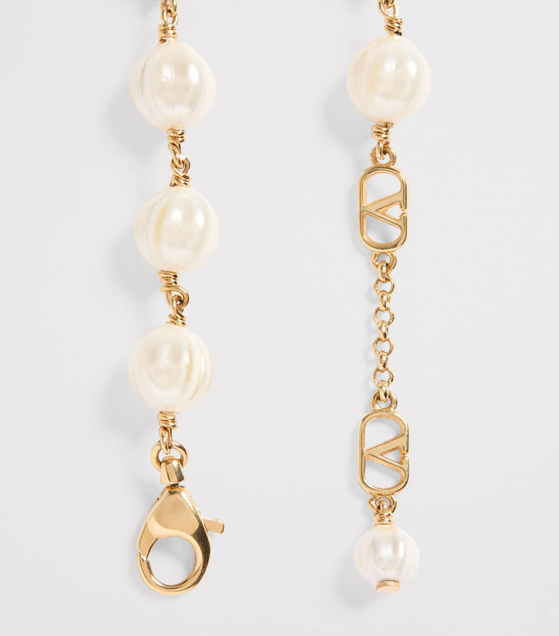 Valentino Garavani faux pearl VLogo bracelet - British product