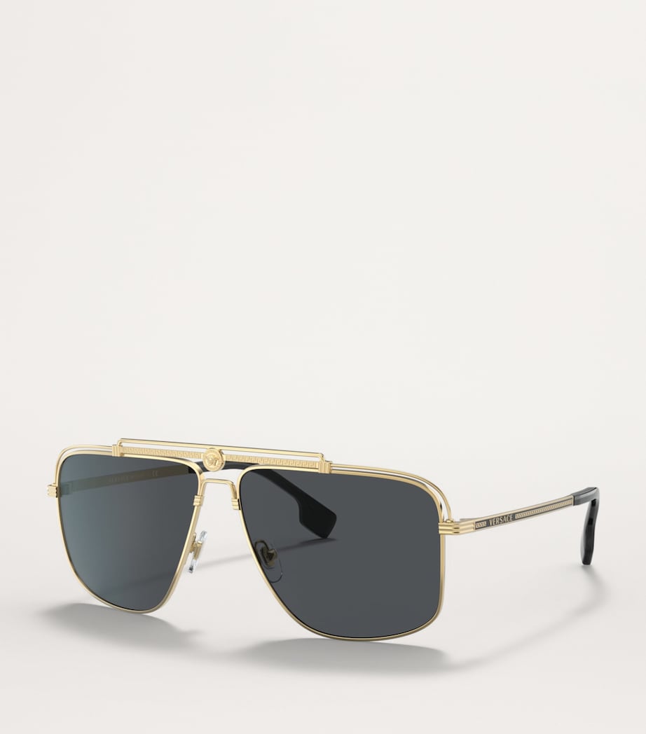 Versace metal aviator sunglasses with gold-tone frame, imported from the UK