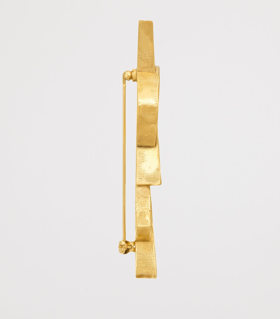 Saint Laurent Cassandre brooch (British brand)