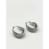SVNX twisted ribbed hoop earrings in silver (British brand)