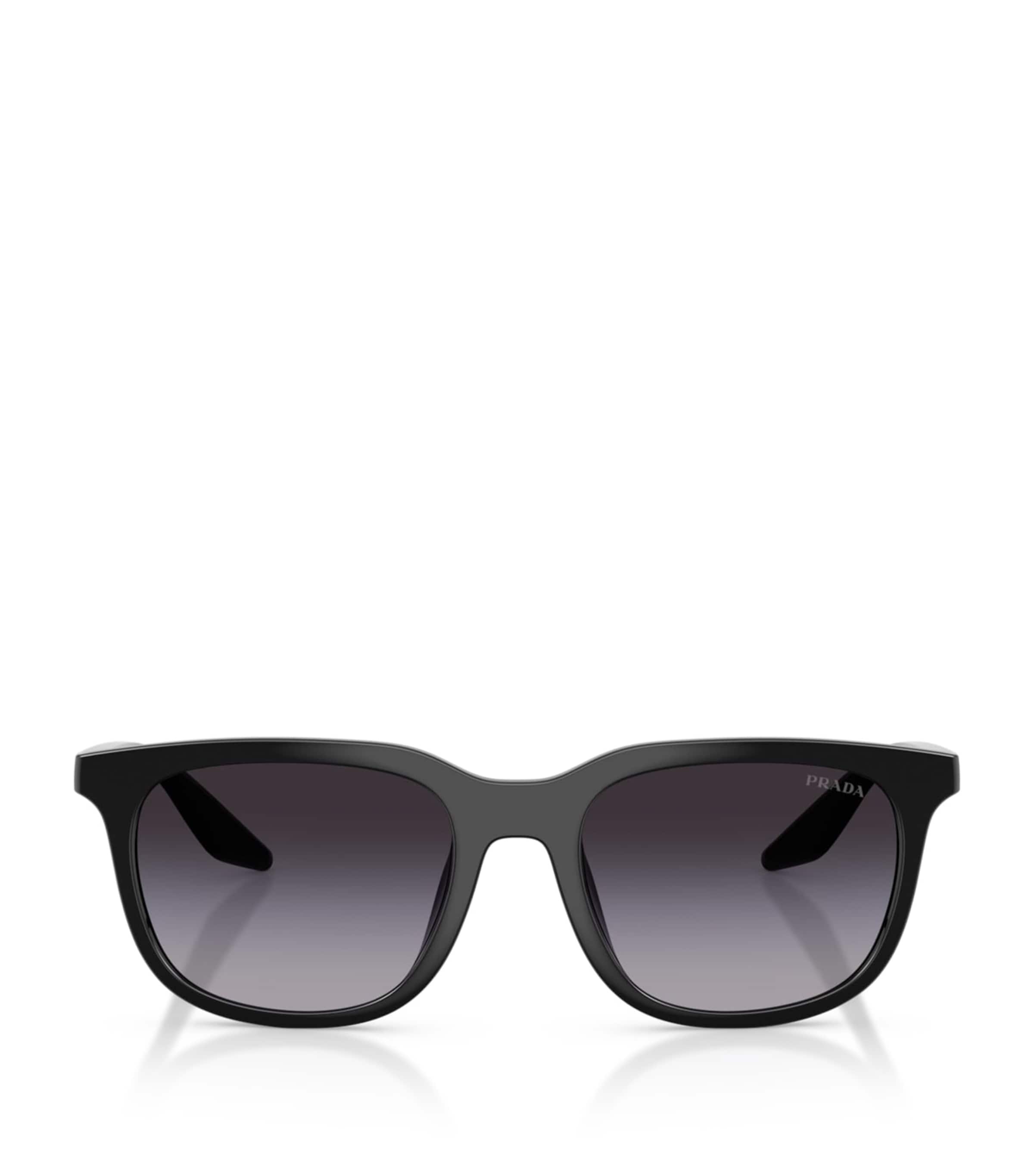 Prada Linea Rossa pillow sunglasses with tinted lenses, imported from the UK