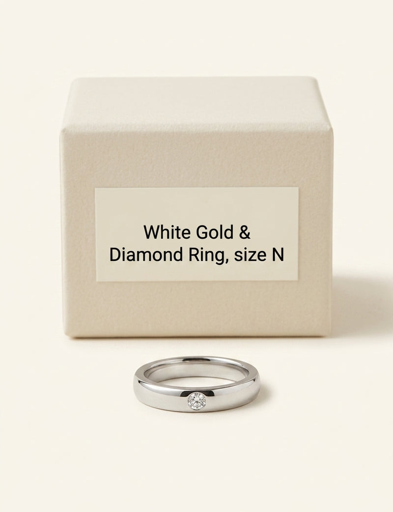 Cartier 18ct white gold diamond ring (British brand)