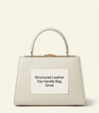 Givenchy Pinch smooth leather top-handle bag with gold accents, UK version