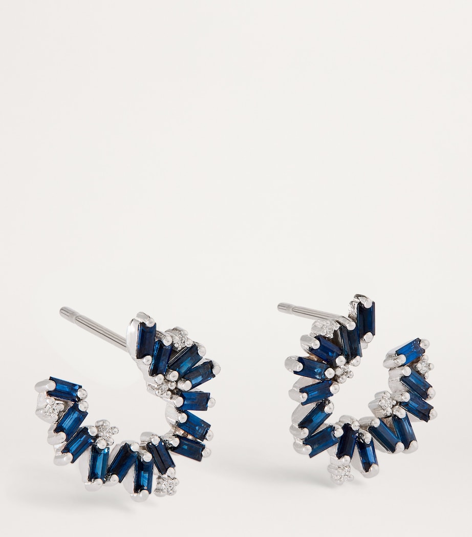 Suzanne Kalan blue sapphire spiral earrings in white gold, imported from the UK