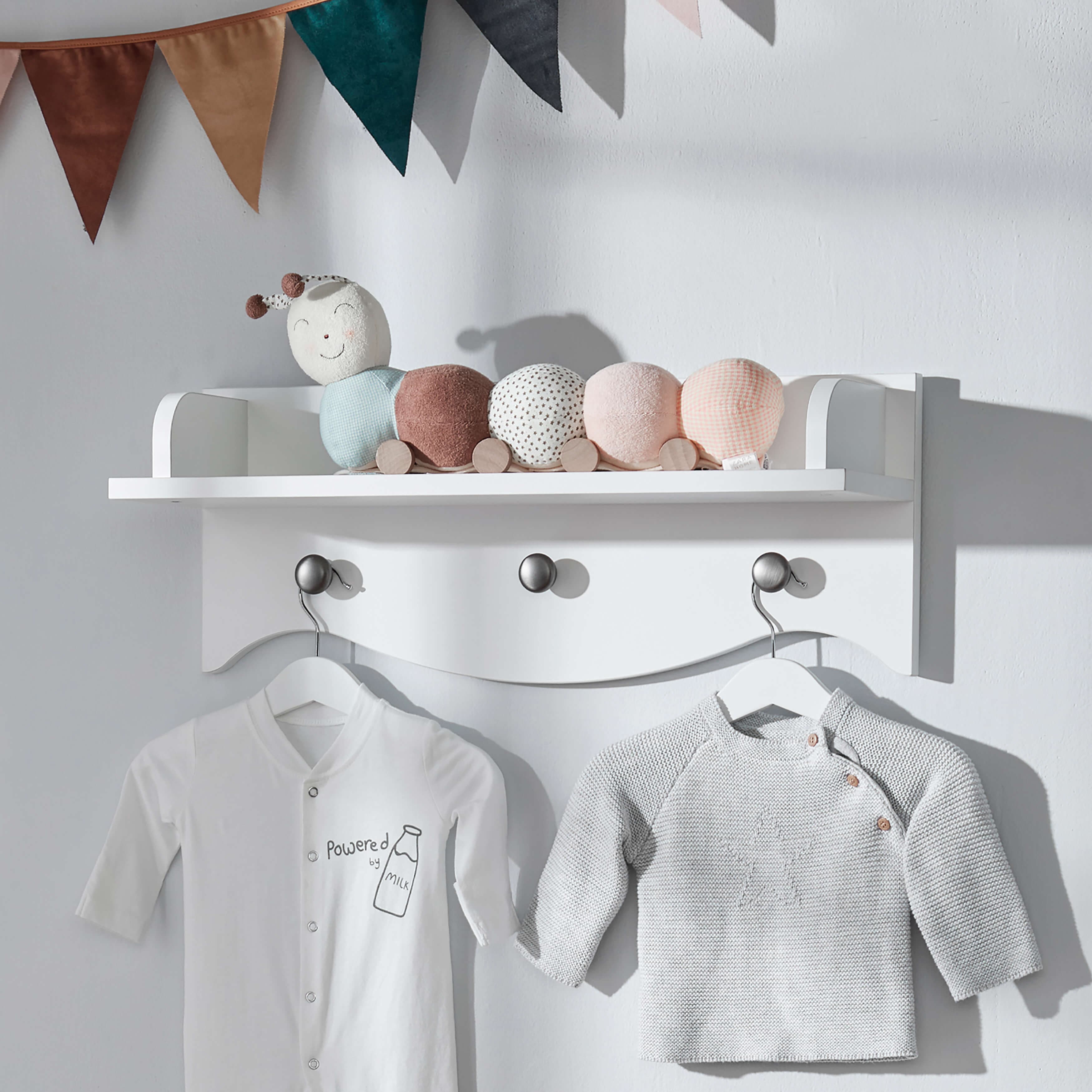 CuddleCo Clara white nursery shelf with pegs - British product