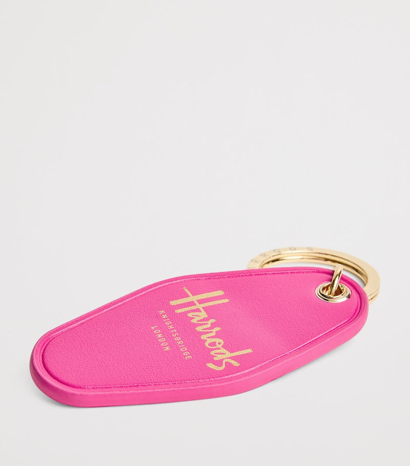 Harrods leather yacht tag keyring in purple with gold foil, imported from the UK