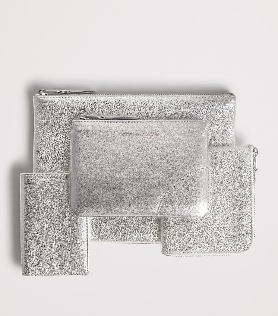 Comme Des Garçons large leather pouch, imported from the UK