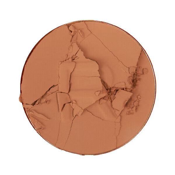 Revolution pressed powder makeup tan shade, imported from the UK