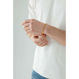SVNX gold stainless steel minimalistic bracelet, imported from the UK