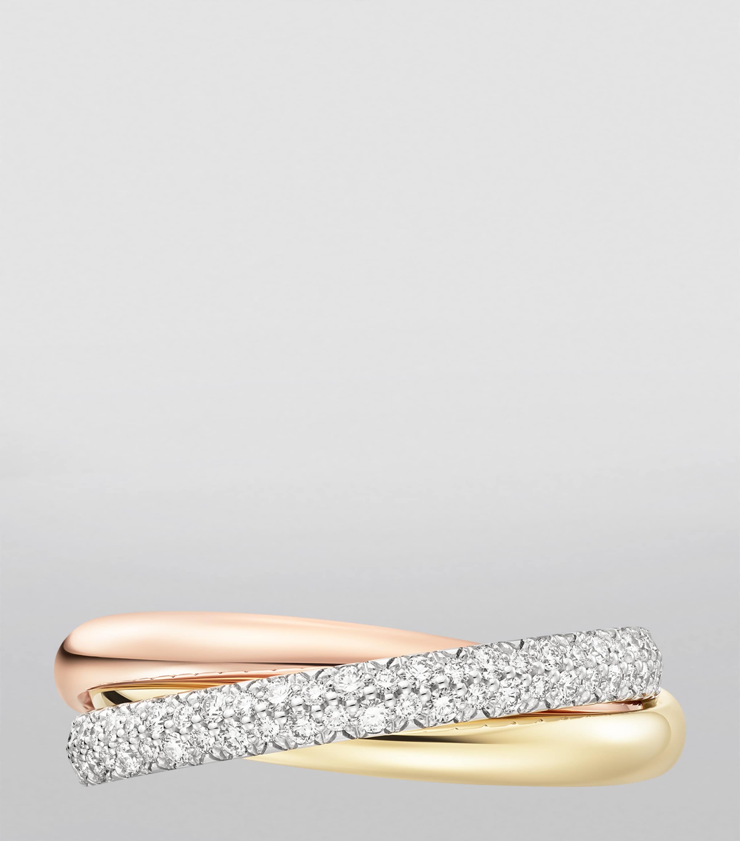 Cartier small Trinity ring three gold bands with pavé diamonds, imported from the UK