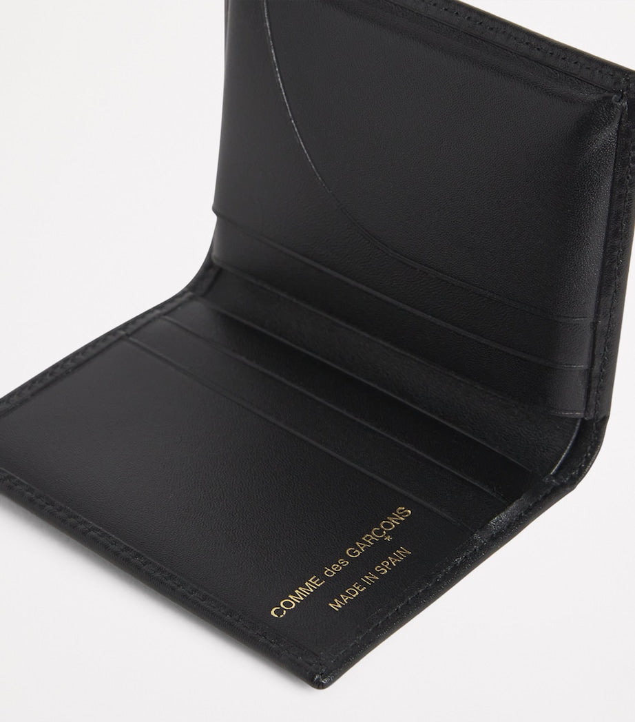 Comme Des Garçons leather wallet with card slots (British brand)