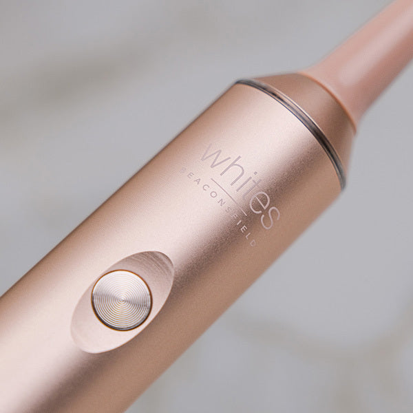 Whites Beaconsfield rose gold sonic electric toothbrush, imported from the UK