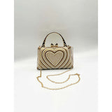 SVNX Heart Pearl Clutch Bag in Gold, UK version
