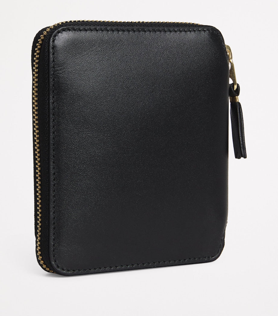 Comme des Garçons zipped leather wallet - British product