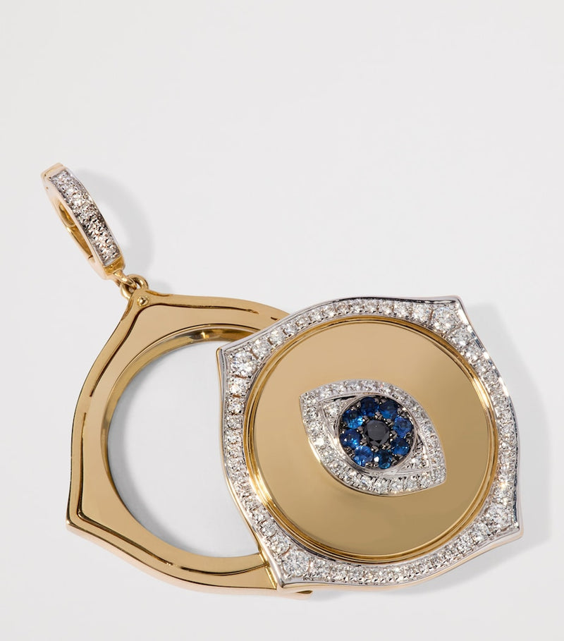 Annoushka gold evil eye charm pendant with diamonds and sapphire, UK version
