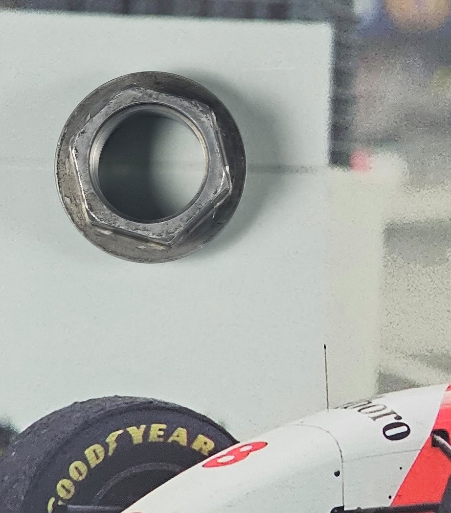Leipzig Galleries Ayrton Senna race-used wheel nut and autograph framed display 69x99x12cm, UK version
