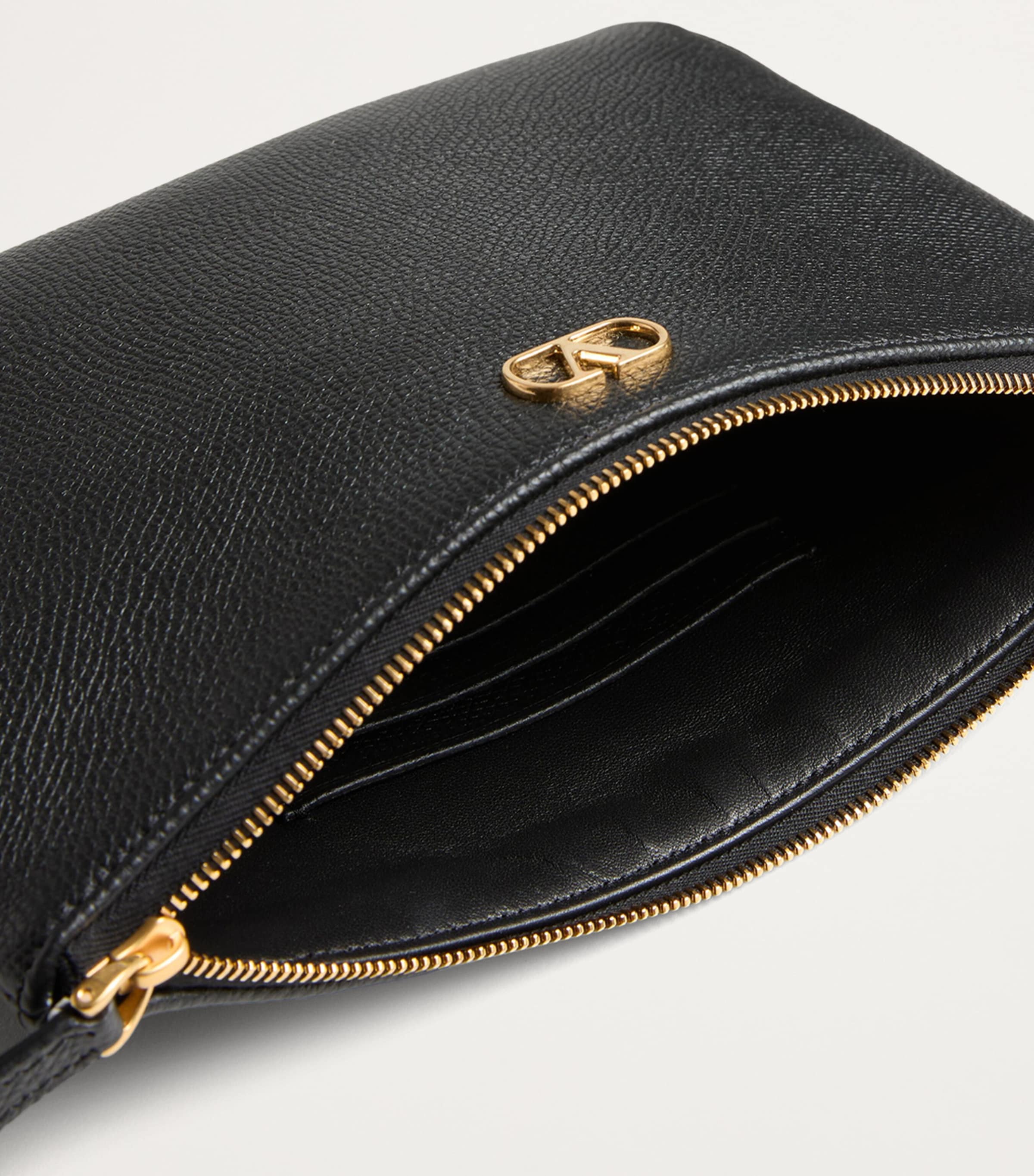Valentino Garavani leather VLogo Signature pouch medium (British brand)