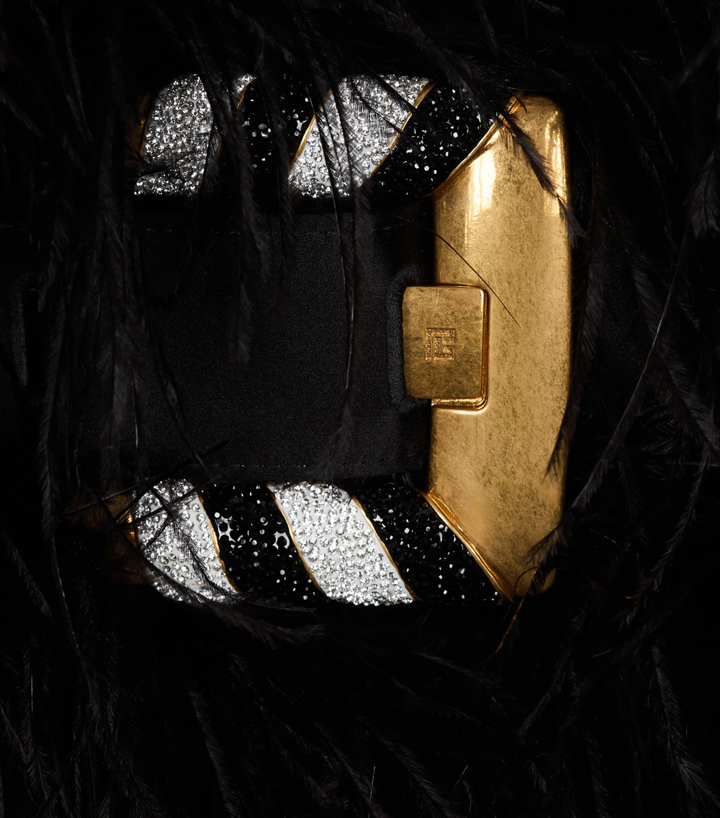 Balmain Anthem clutch bag with long fibres and gold buckle, imported from the UK