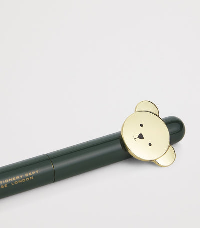Stylo bille avec topper en forme d'ours et mécanisme rotatif