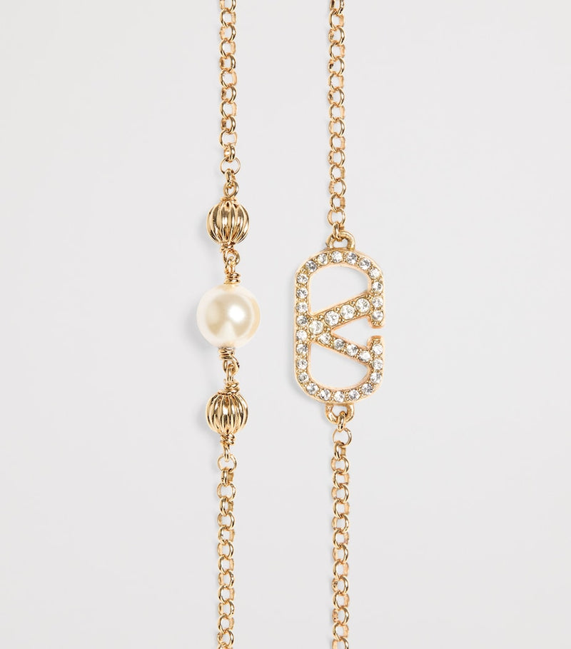 Valentino Garavani VLogo bracelet faux pearls Swarovski crystals, imported from the UK