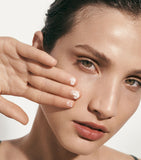 La Mer skincare set including moisturizing cream, lip treatment, and lip volumizer, UK version