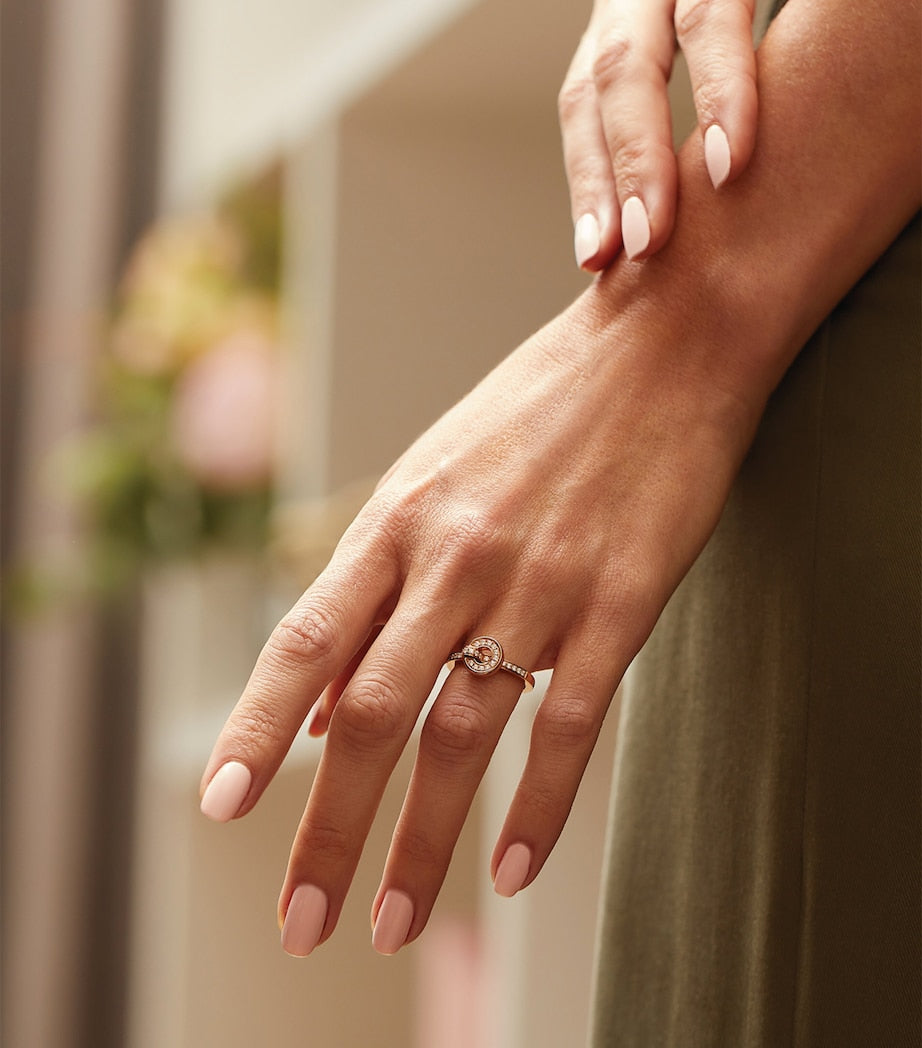 Boodles rose gold flip ring with diamonds, imported from the UK