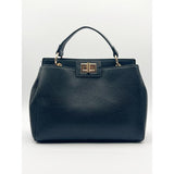 SVNX black faux leather handbag with gold trim (British brand)