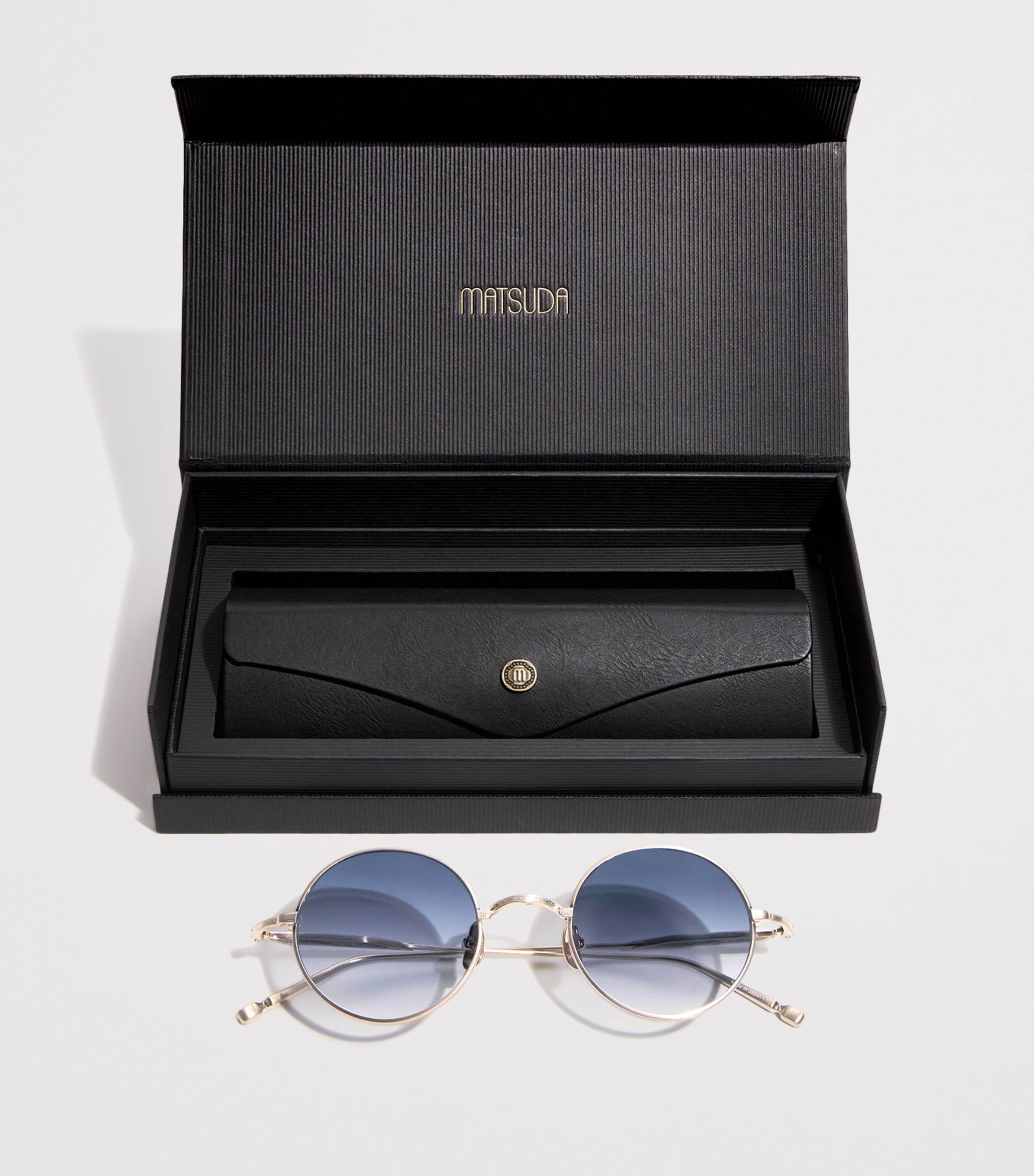 Matsuda M3168 runde Sonnenbrille aus Titan, UK-Version