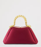Bvlgari mini satin serpentine top-handle bag, imported from the UK