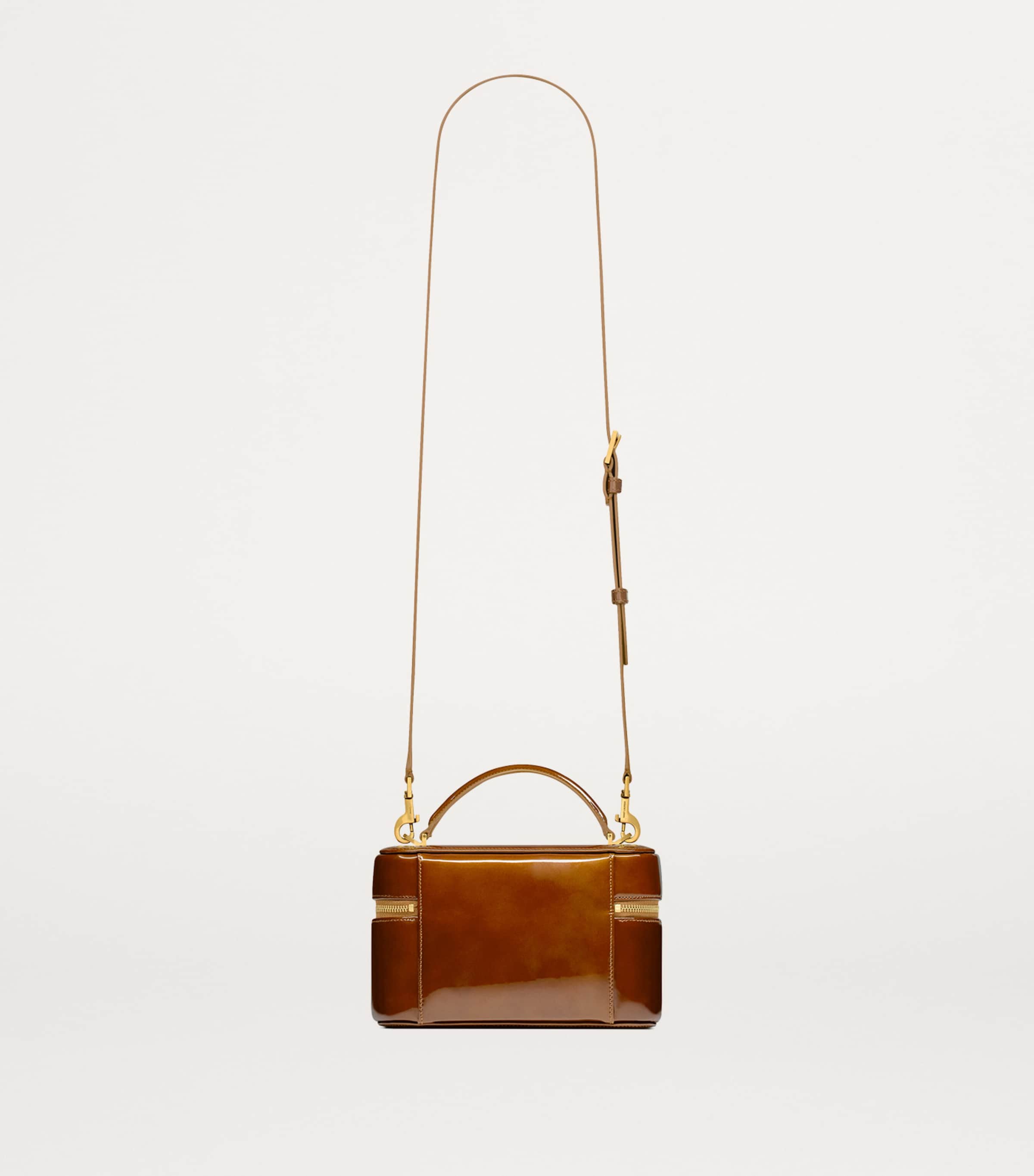 Saint Laurent Gaby patent leather top-handle bag - British product