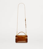 Saint Laurent Gaby patent leather top-handle bag - British product