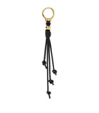 LOEWE leather and stainless steel bag charm with tassels, UK version