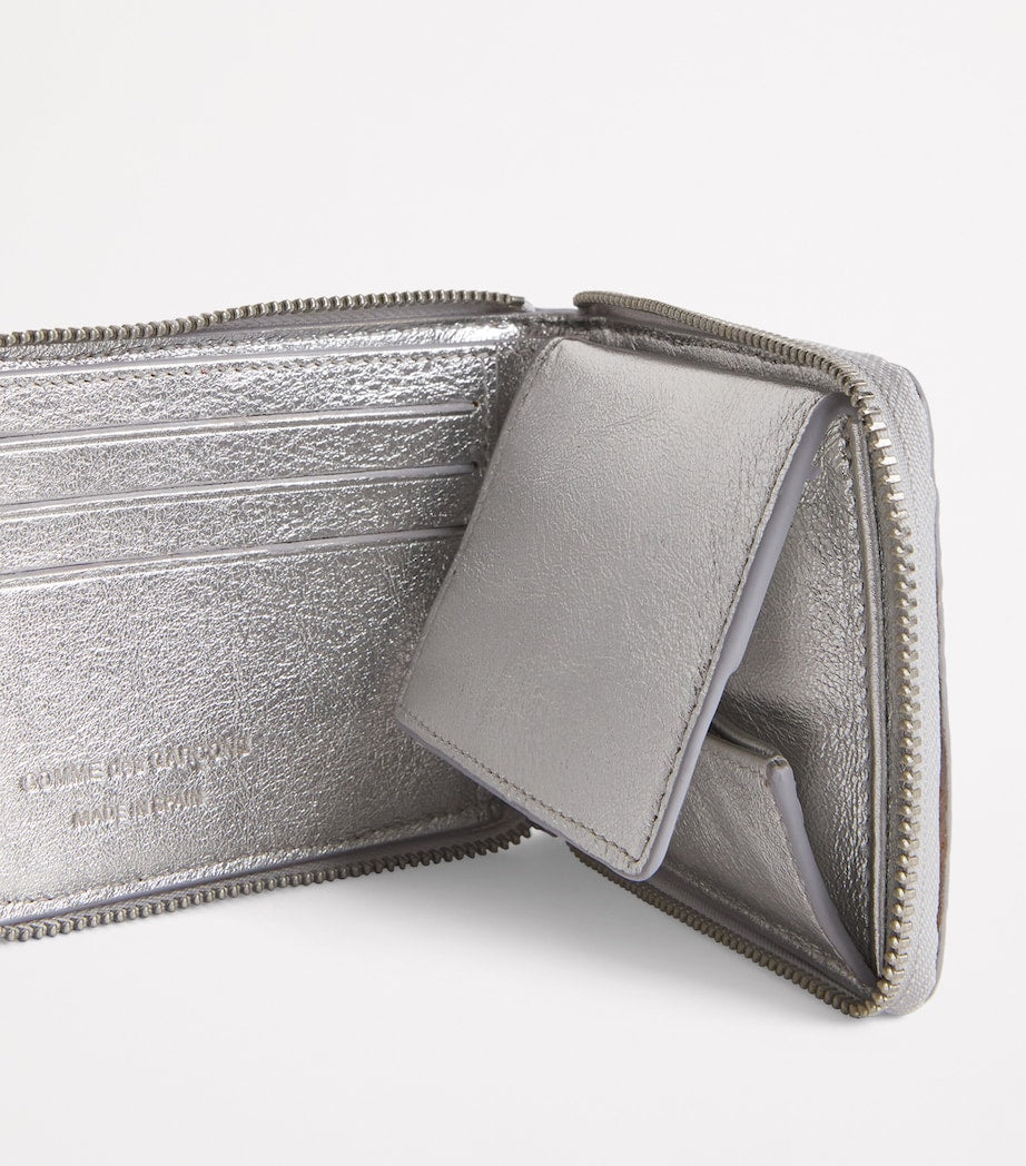 Comme des Garçons wallet embossed logo zip, imported from the UK