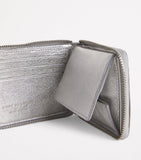 Comme des Garçons wallet embossed logo zip, imported from the UK