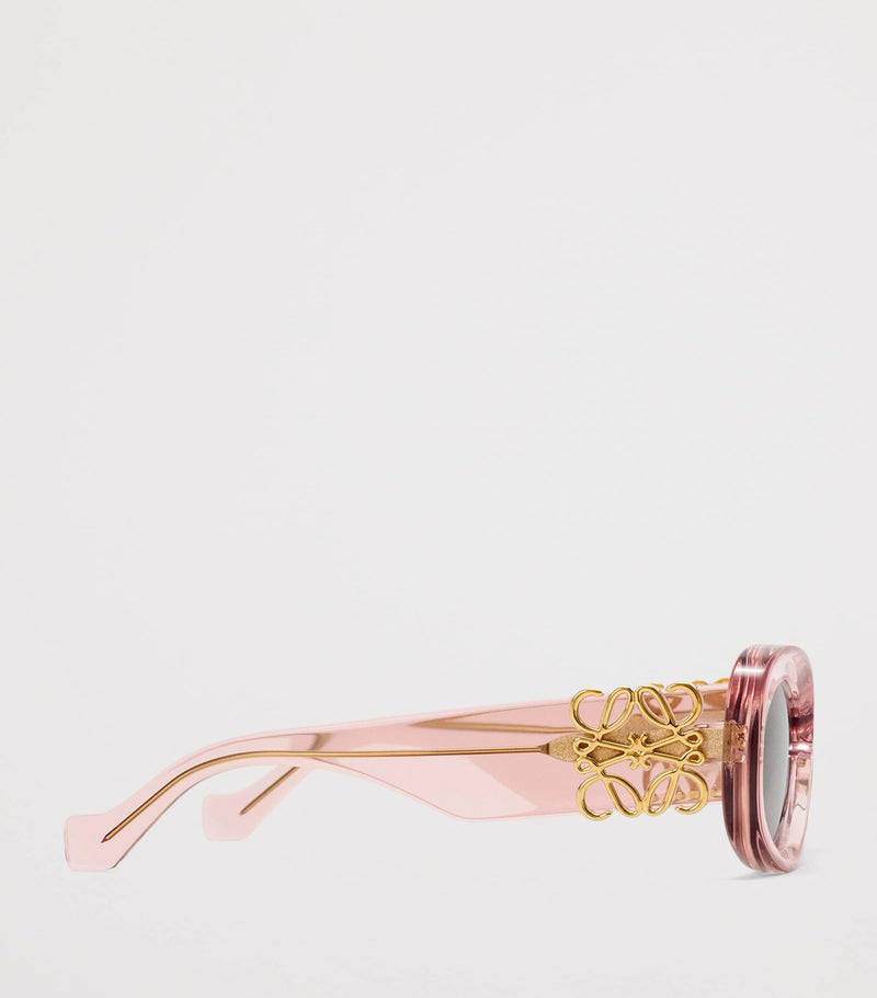 LOEWE oval sunglasses with bevelled acetate frame, imported from the UK