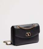 Valentino Garavani Djuna lambskin shoulder bag with gold VLOGO hardware, UK version